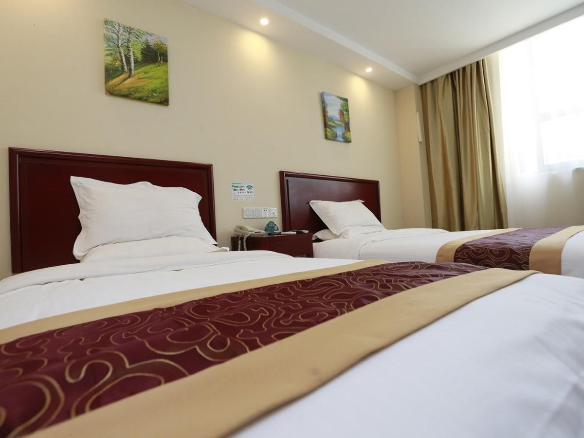 Greentree Inn Henan Qinyang Middle Huaifu Road Express Hotel Buitenkant foto
